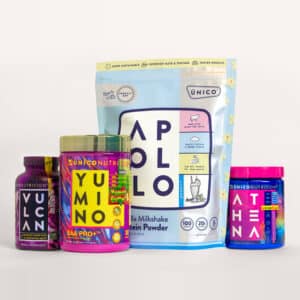 unico total spectrum complete supplement bundle for women - including protein powder, pre workout drink, amino acids, and weight loss capsules - product photography on beige light-colored background