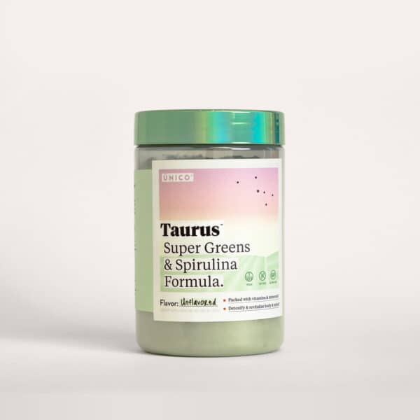 unico taurus super greens supplement - antioxidant formula with organic vegetables and spirulina packaging photo on studio with dramatic lighting