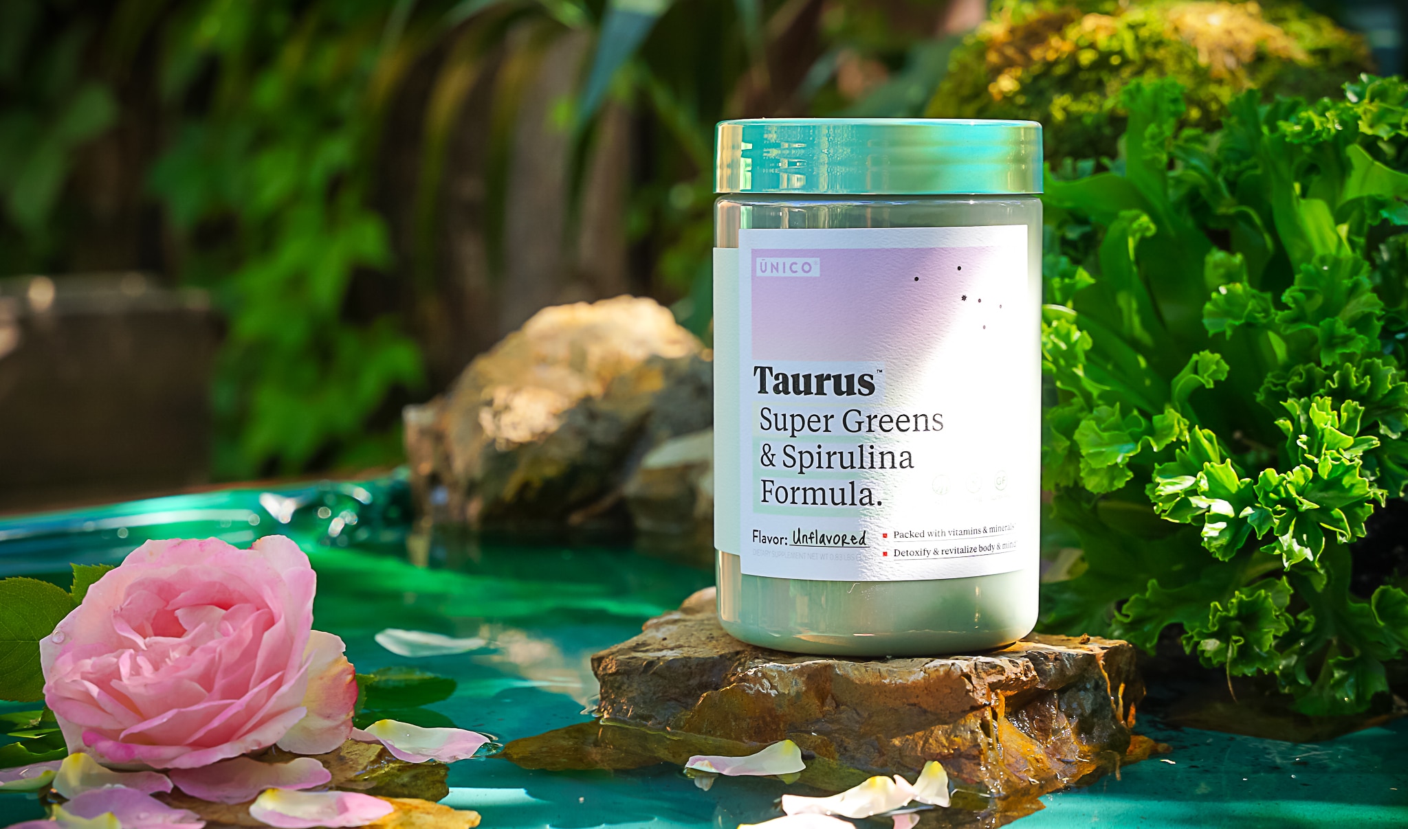 unico taurus greens supplement with pink flower in lagoon setting