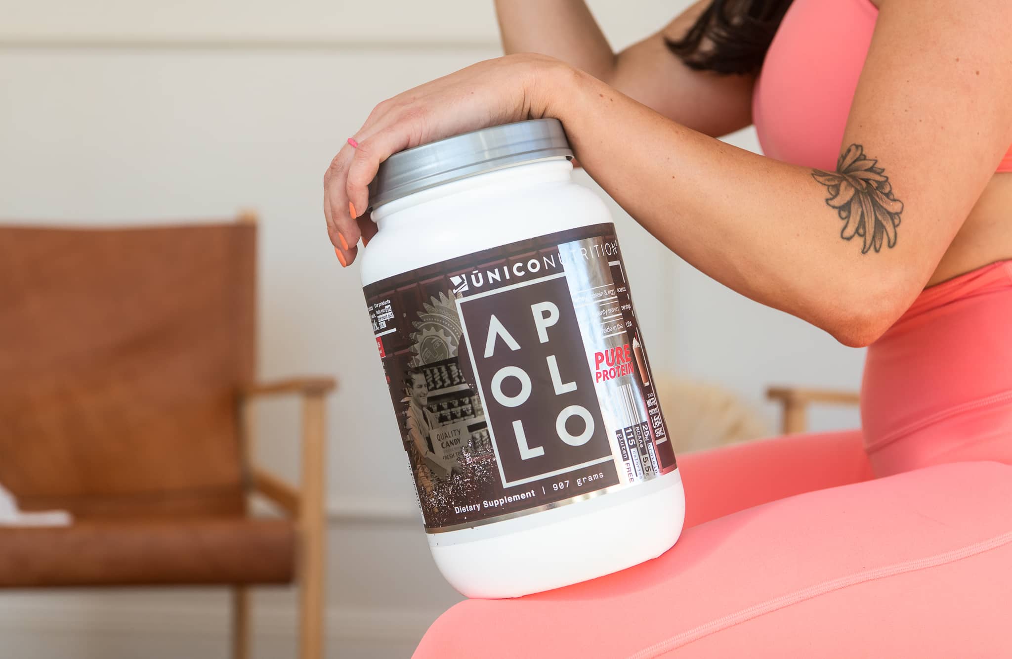 woman with protein powder on lap